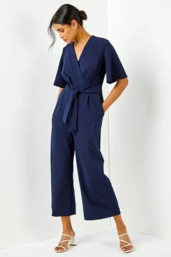Roman Navy Blue Angel Sleeve Wrap Jumpsuit 9 Roman Navy Blue Angel Sleeve Wrap Jumpsuit -Roman Sales Shop unnamed file 11332