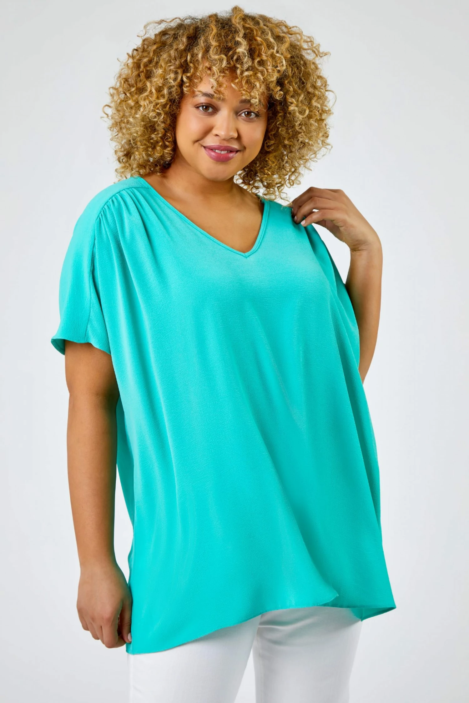 Roman Blue Curve Plain Yoke Detail Swing Top 3 Roman Blue Curve Plain Yoke Detail Swing Top